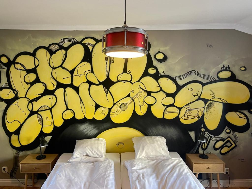 Postel nebo postele na pokoji v ubytování Hotell Vaxblekaregården