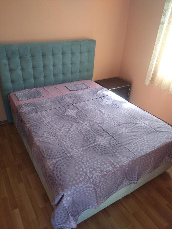 Postel nebo postele na pokoji v ubytování White House Avtandil&Nino