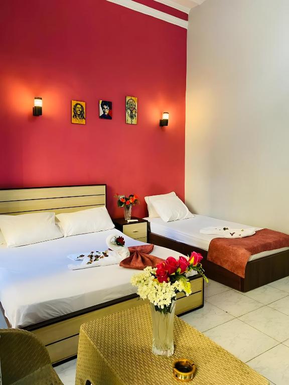 Postel nebo postele na pokoji v ubytování Hostgram Hotel in cairo