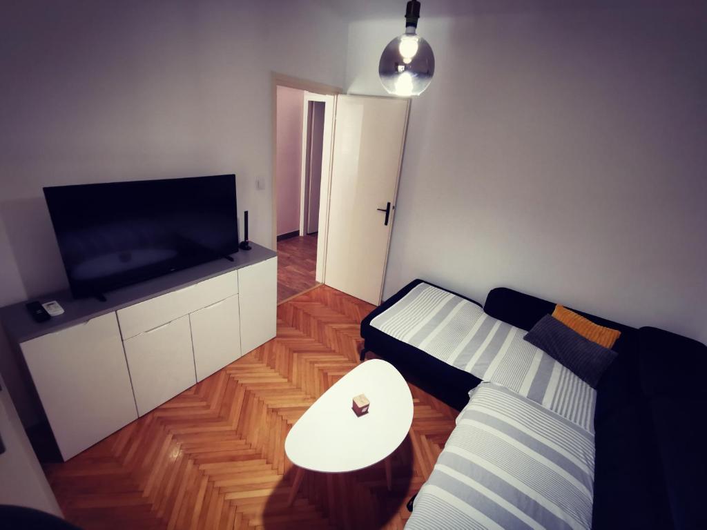 Posteľ alebo postele v izbe v ubytovaní Apartments Indira