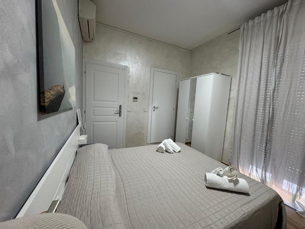 Postel nebo postele na pokoji v ubytování Hotel Eriale Nuova Gestione