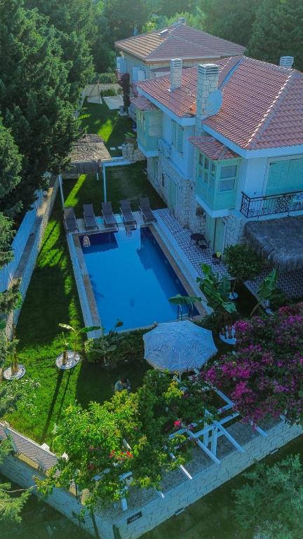 an aerial view of a house with a swimming pool at The One Alacatı in Çeşme