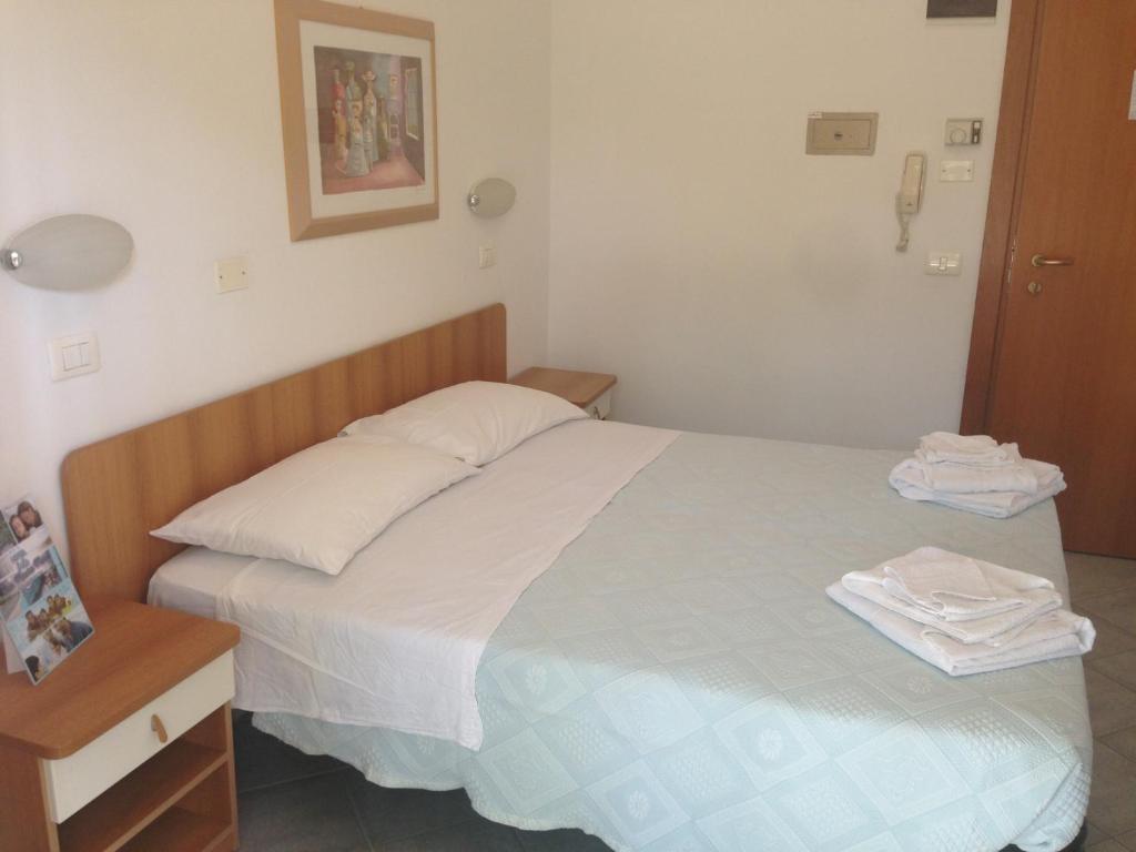 Postel nebo postele na pokoji v ubytování Hotel Jole