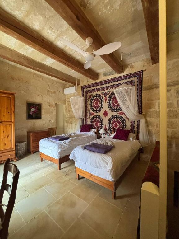 Una cama o camas en una habitación de House of Character - Room with a Pool view