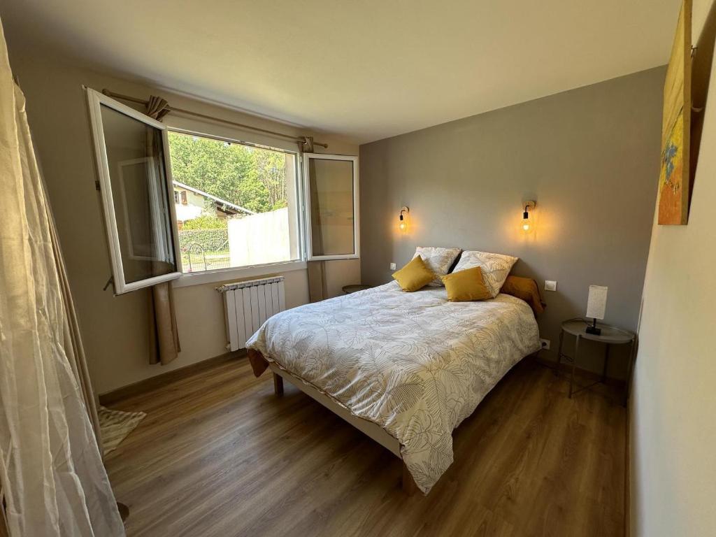 Ένα ή περισσότερα κρεβάτια σε δωμάτιο στο Chambre d'hôtes Chez Papi,meublé tourisme 3 étoiles