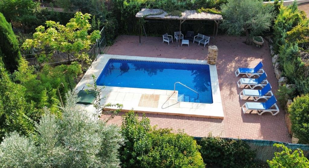 an overhead view of a swimming pool in a backyard at Casa Rural Pernales II in Ruidera