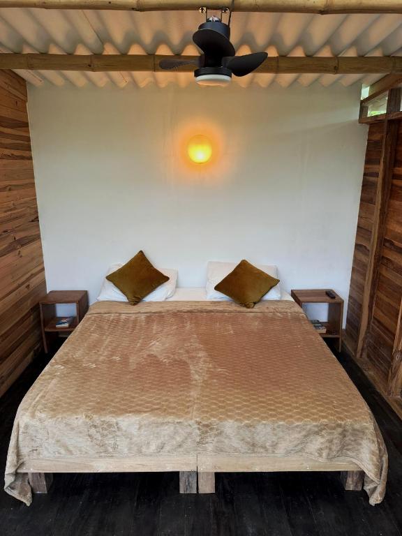 Letto o letti in una camera di La Mona Eco Cabins