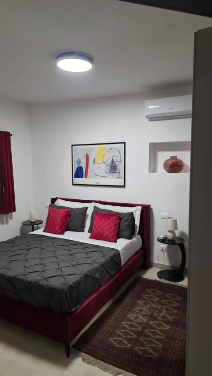 Postel nebo postele na pokoji v ubytování Oltre la Siepe Apartment
