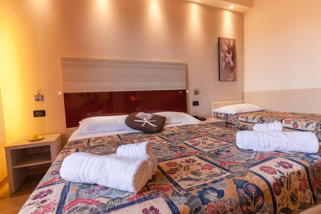 Postel nebo postele na pokoji v ubytování Hotel Krone