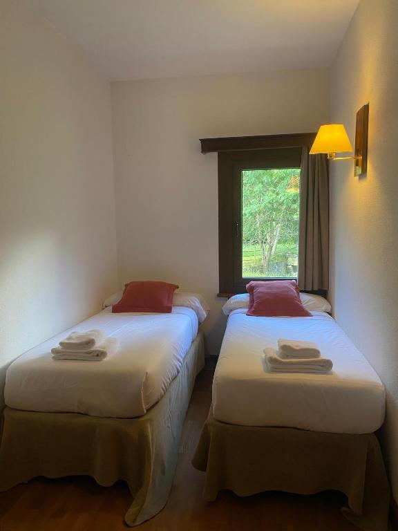 Postel nebo postele na pokoji v ubytování Hotel Els Avets
