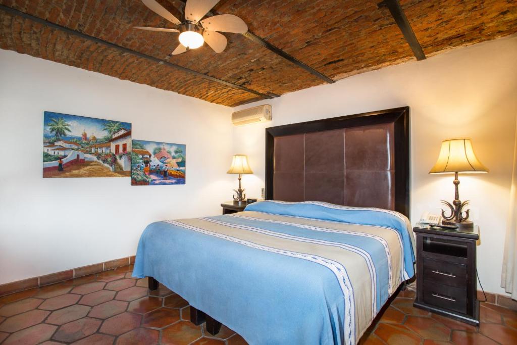 Postel nebo postele na pokoji v ubytování Quinta Don Jose Boutique Hotel