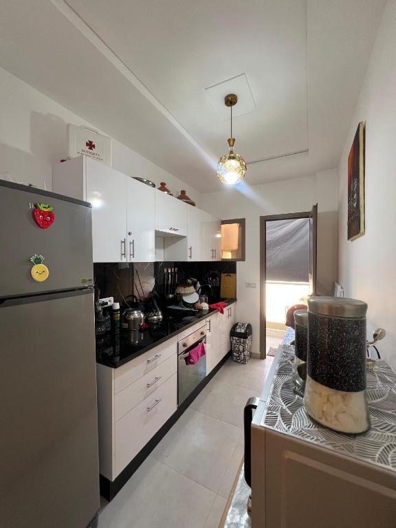 Kuchyň nebo kuchyňský kout v ubytování Appartement Irena neuf à 5 min de la plage