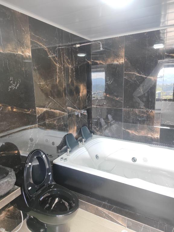 Koupelna v ubytování Hotel maripipark