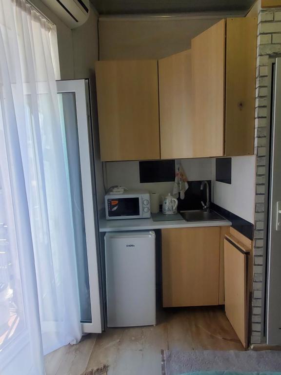 Kuchyň nebo kuchyňský kout v ubytování room