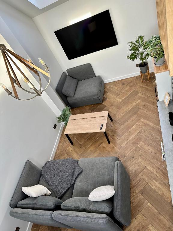 The garden house - the tiny house experience的电视和/或娱乐中心