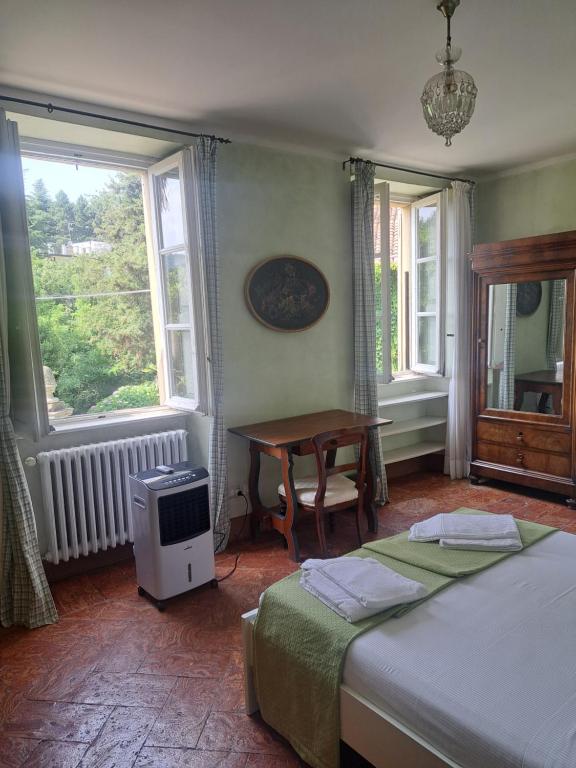 Posteľ alebo postele v izbe v ubytovaní Villa Corti Lakeview