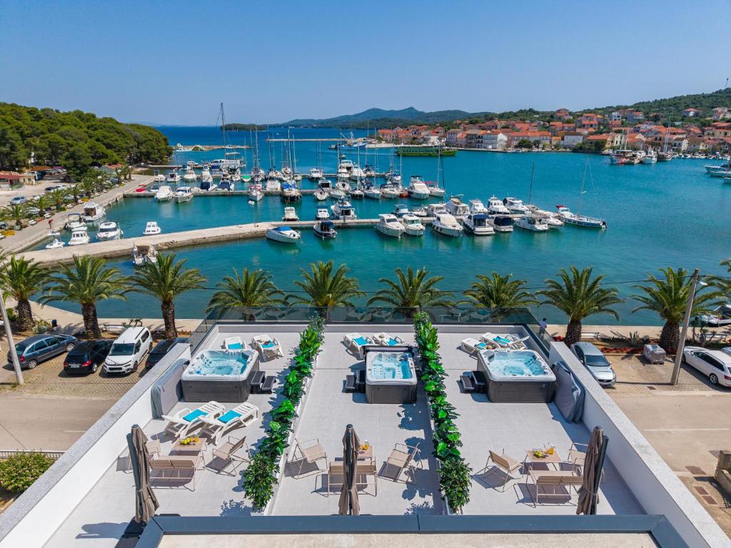 a view of a marina with boats in the water at Penthouse Apartments Dora Kukljica in Kukljica
