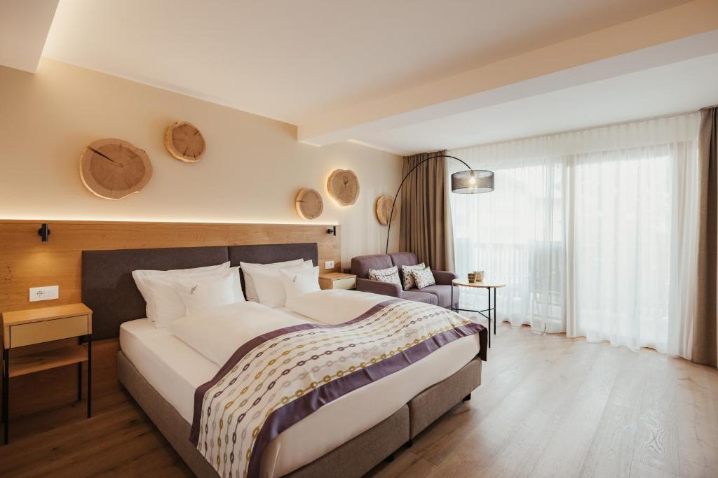 Postel nebo postele na pokoji v ubytování Hotel Diamant