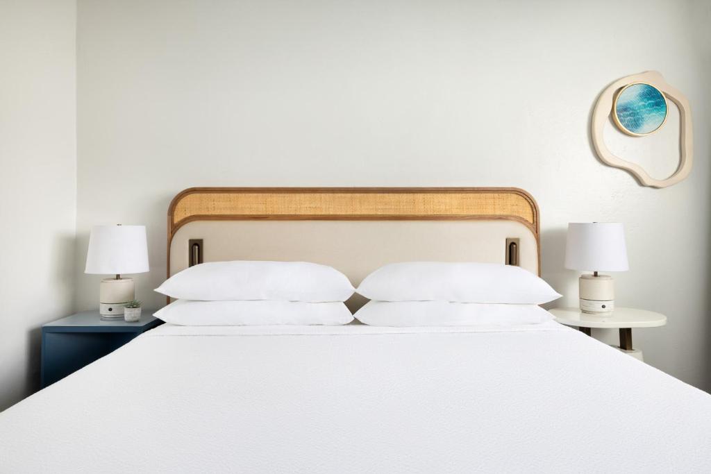 Postel nebo postele na pokoji v ubytování Verdanza Hotel