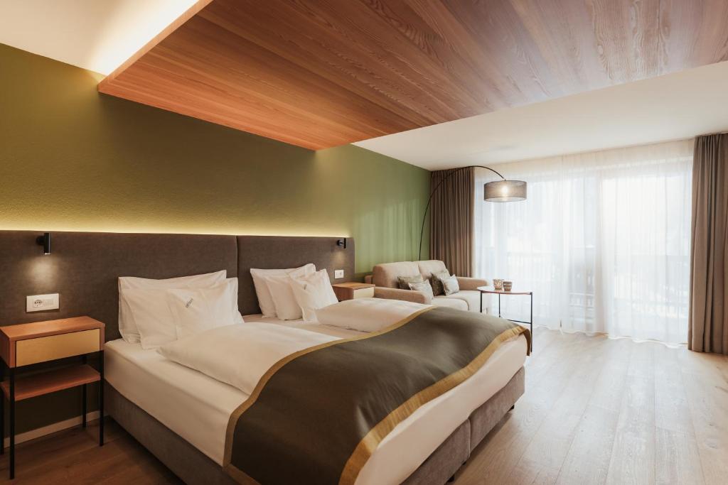 Postel nebo postele na pokoji v ubytování Hotel Diamant