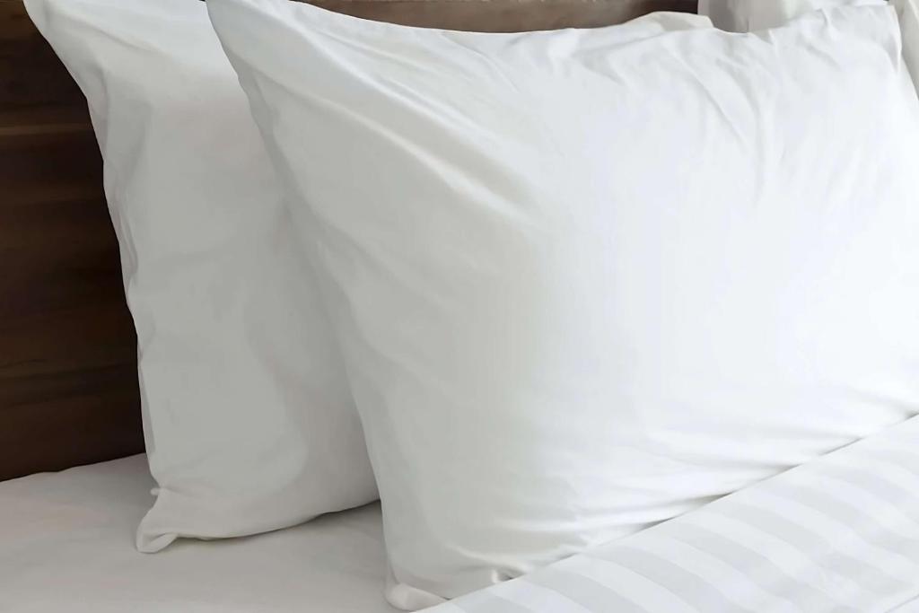 Ein Bett oder Betten in einem Zimmer der Unterkunft Eastgate Hotel - BW Signature Collection