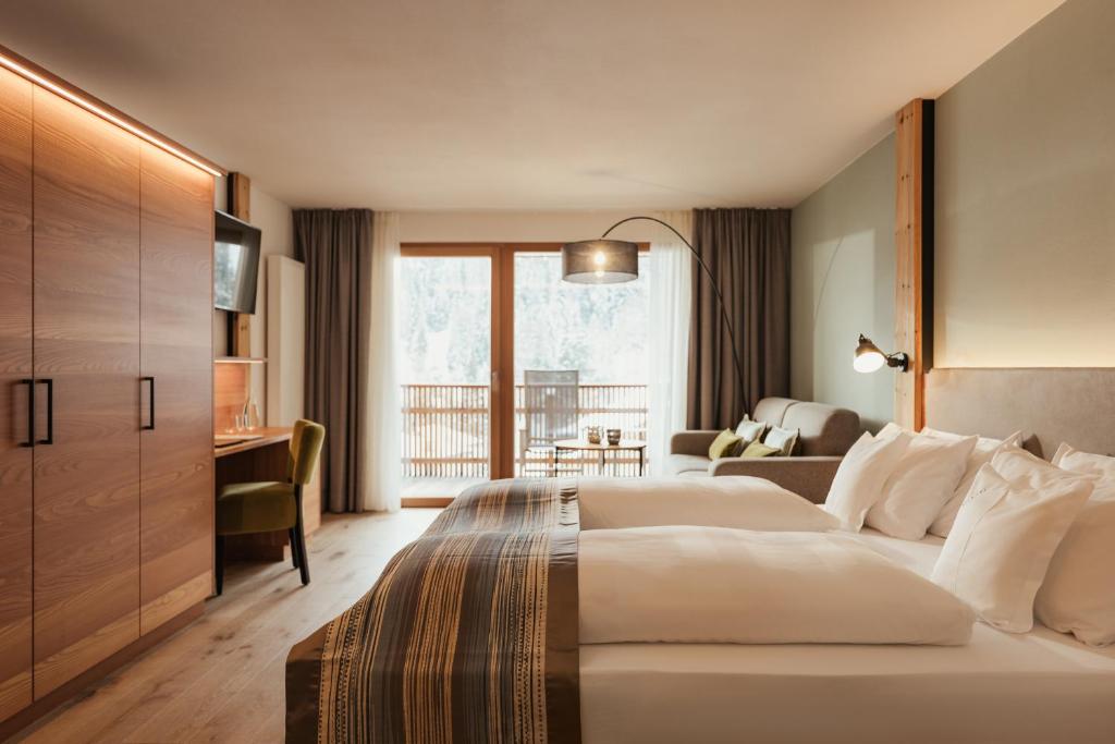 Postel nebo postele na pokoji v ubytování Hotel Diamant