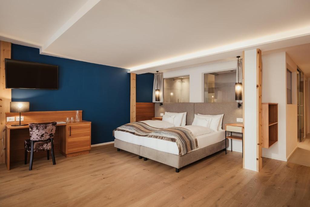 Postel nebo postele na pokoji v ubytování Hotel Diamant