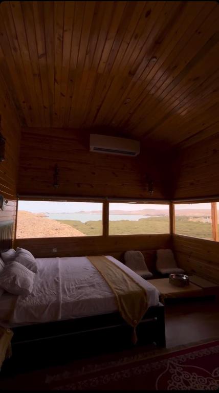 Postel nebo postele na pokoji v ubytování Dew Hut