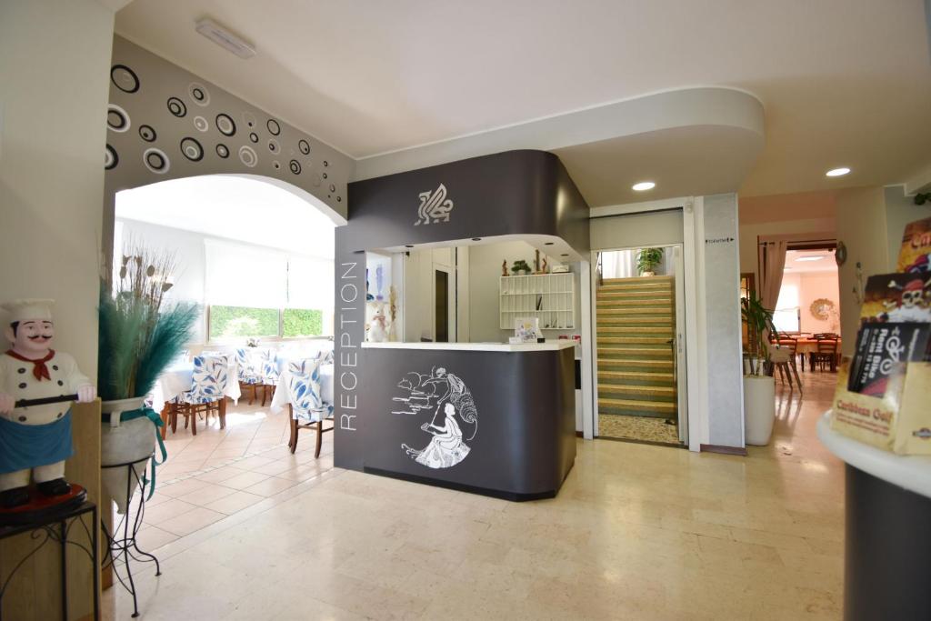 Kuchyň nebo kuchyňský kout v ubytování Hotel Grifone