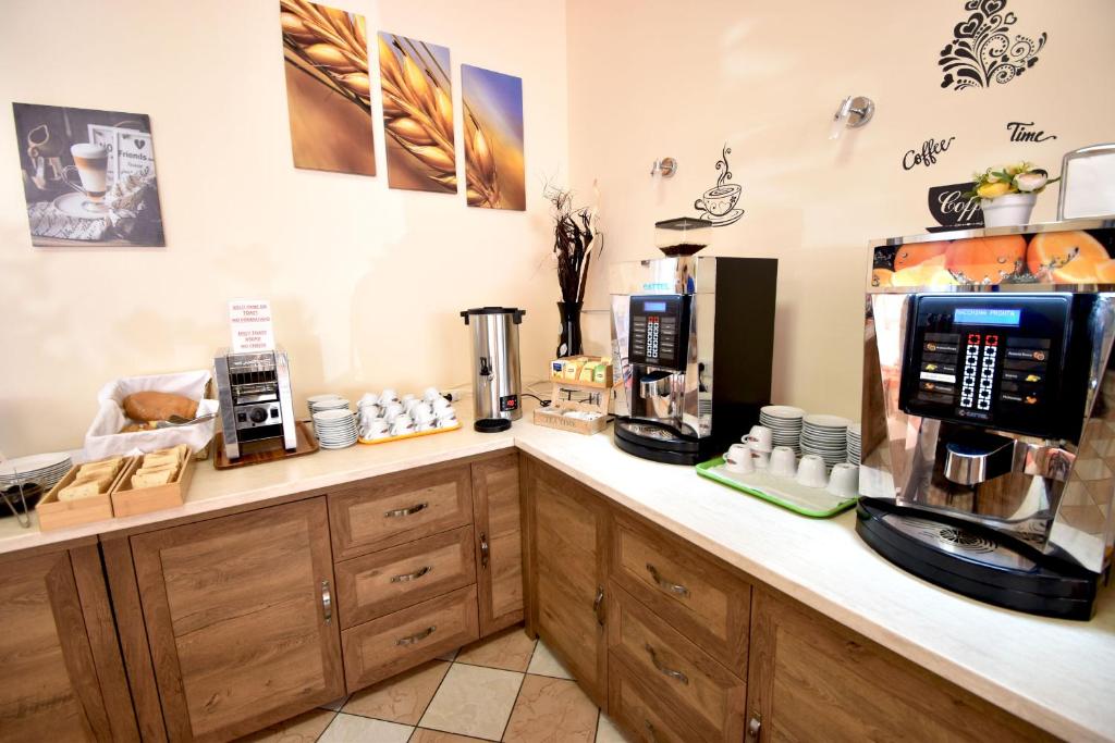 Příslušenství pro přípravu čaje a kávy v ubytování Hotel Grifone