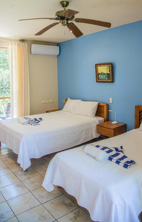 Postel nebo postele na pokoji v ubytování Hotel Sol Sámara