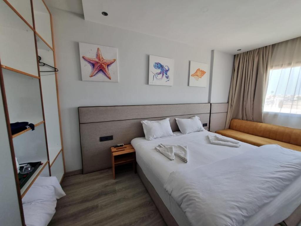 Postel nebo postele na pokoji v ubytování Seashell