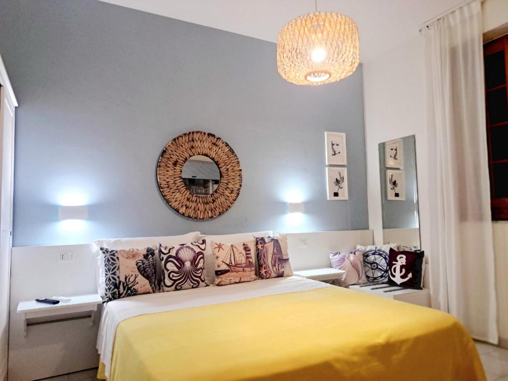 Łóżko lub łóżka w pokoju w obiekcie La Villa di Eracle
