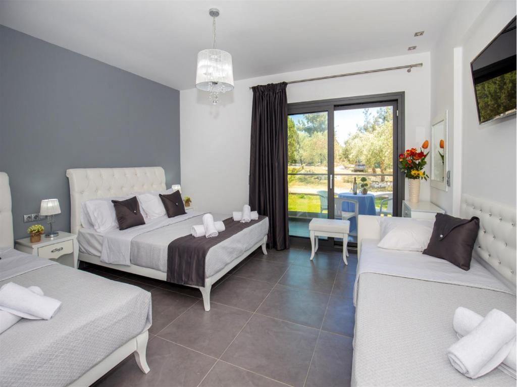 Postel nebo postele na pokoji v ubytování Astris Sun Hotel