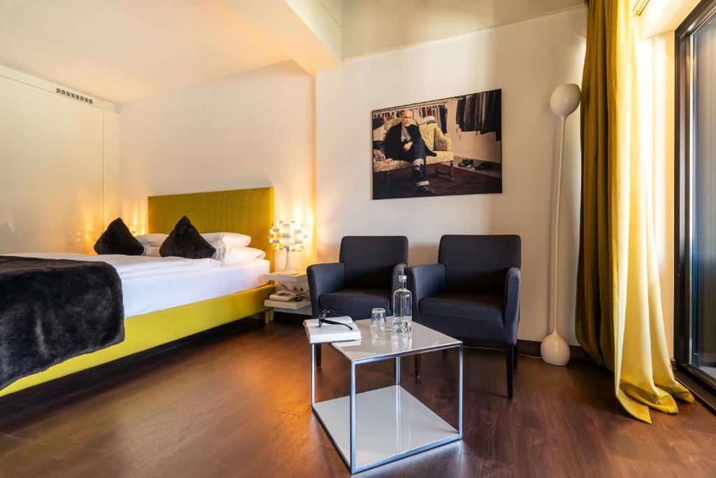 Postel nebo postele na pokoji v ubytování Hotel Gartner