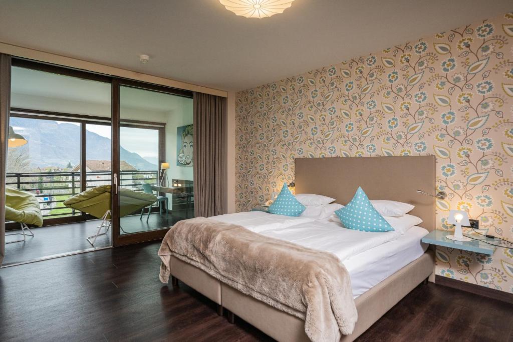 Postel nebo postele na pokoji v ubytování Hotel Gartner