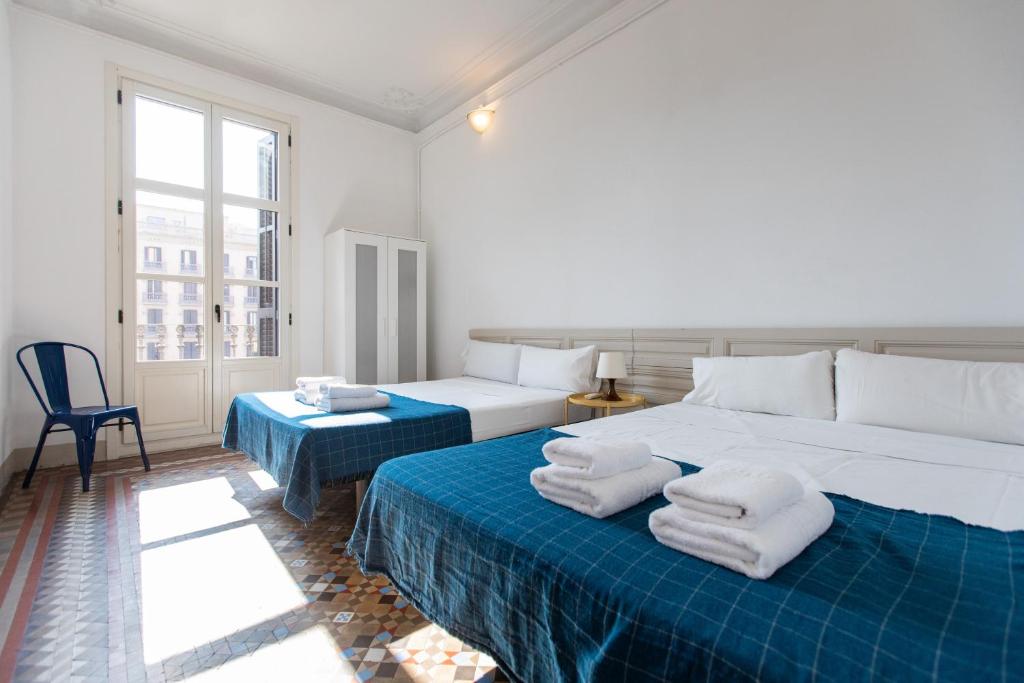 Posteľ alebo postele v izbe v ubytovaní b21-Apartamento Modernista para Grupos
