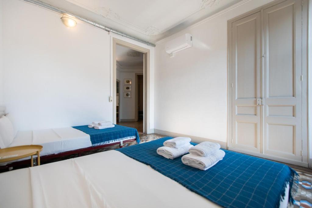 Posteľ alebo postele v izbe v ubytovaní b21-Apartamento Modernista para Grupos