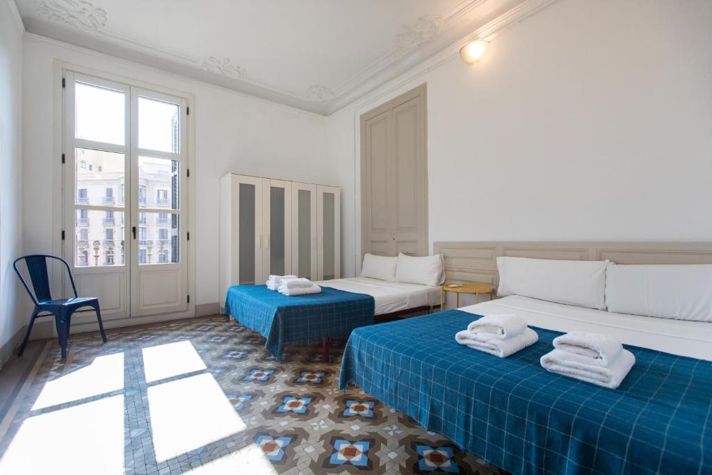 Posteľ alebo postele v izbe v ubytovaní b21-Apartamento Modernista para Grupos