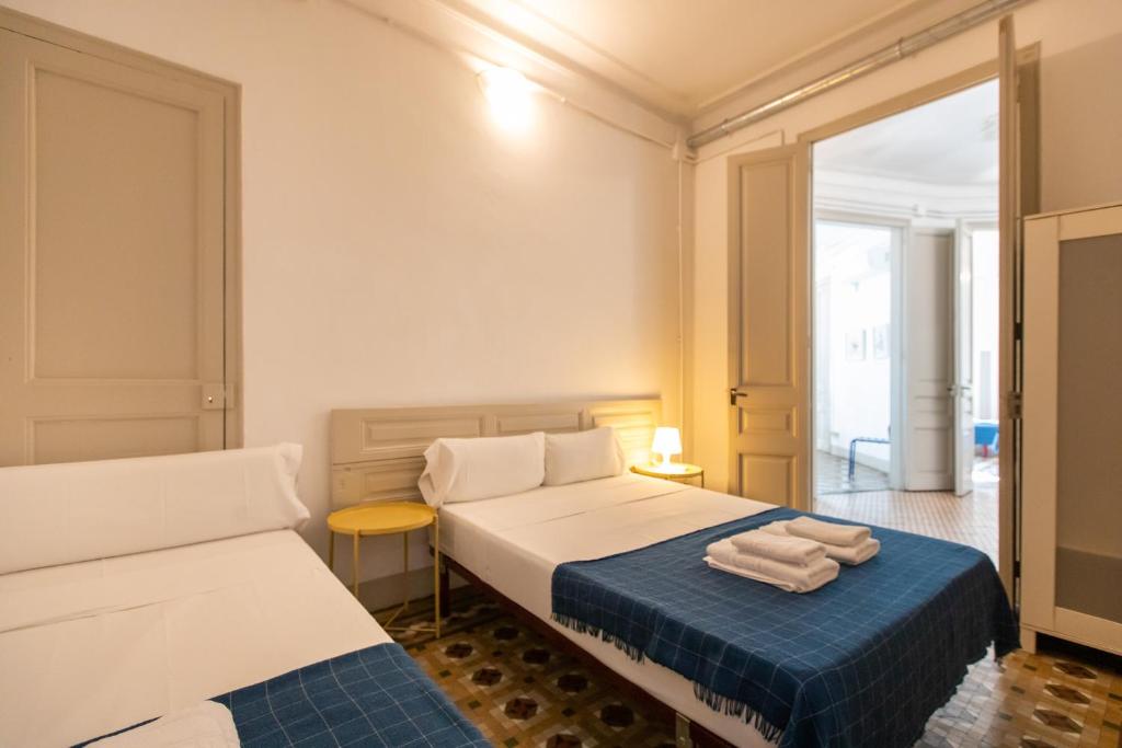 Posteľ alebo postele v izbe v ubytovaní b21-Apartamento Modernista para Grupos