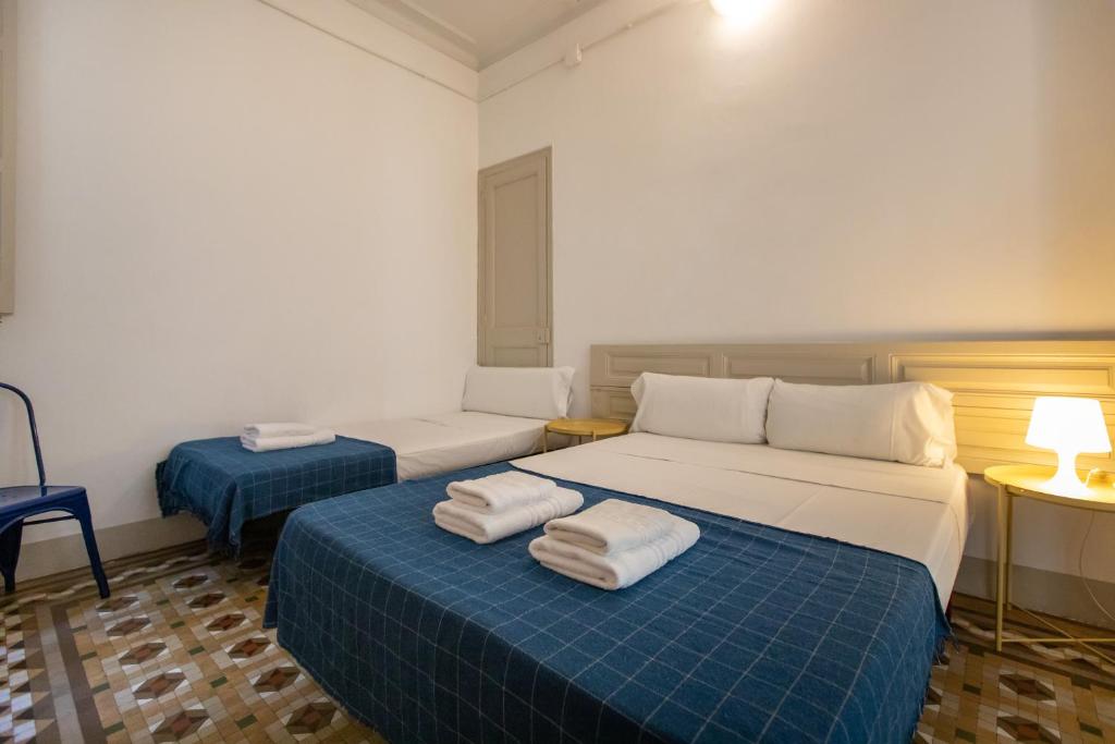 Posteľ alebo postele v izbe v ubytovaní b21-Apartamento Modernista para Grupos