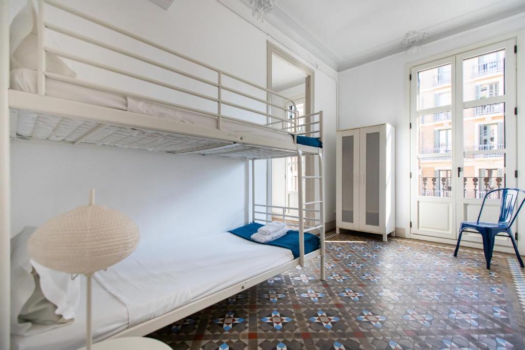Posteľ alebo postele v izbe v ubytovaní b21-Apartamento Modernista para Grupos