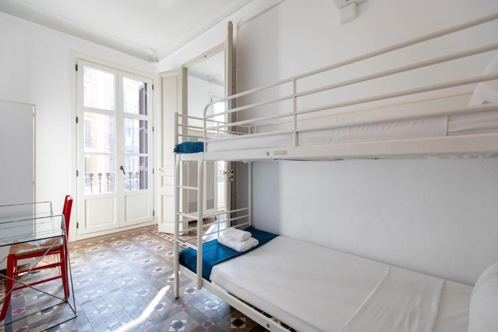 Posteľ alebo postele v izbe v ubytovaní b21-Apartamento Modernista para Grupos