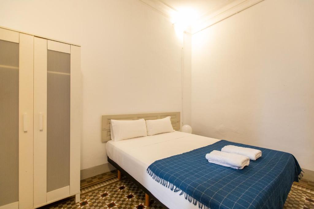Posteľ alebo postele v izbe v ubytovaní b21-Apartamento Modernista para Grupos