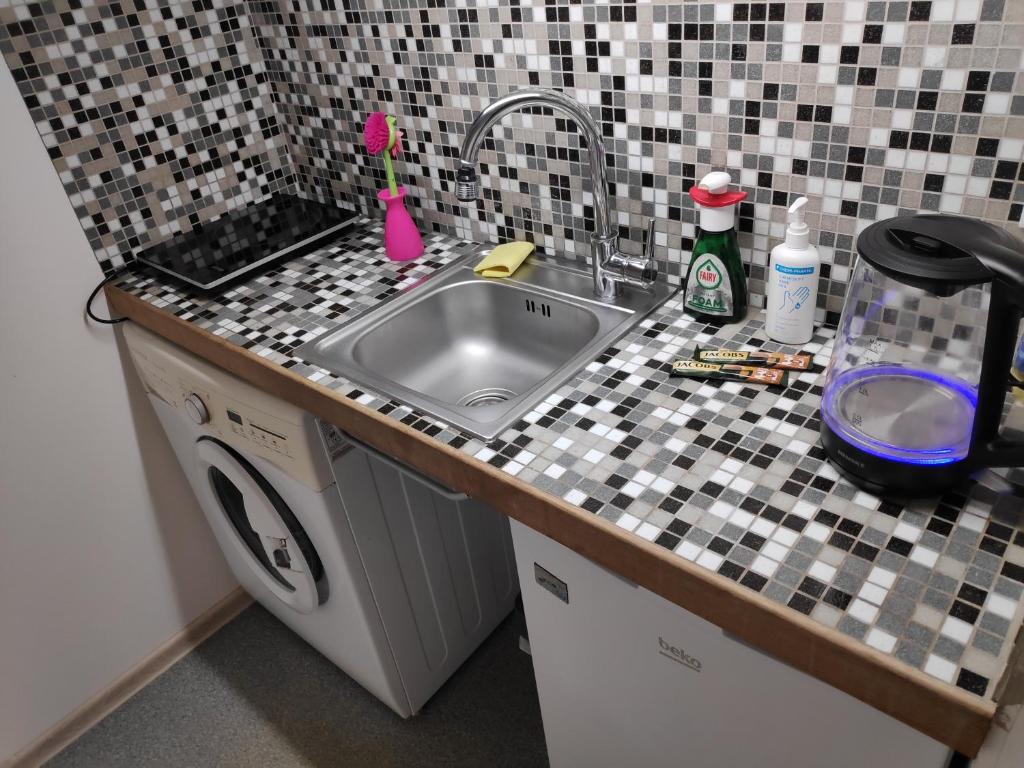 Una cocina o cocineta en Forrent-ee