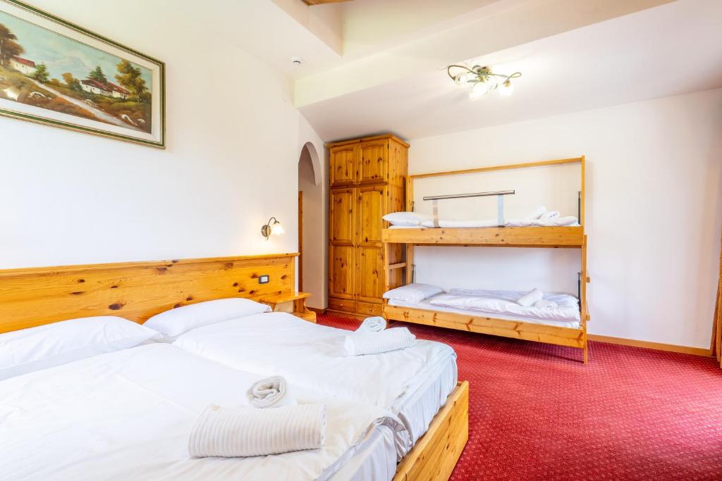 Postel nebo postele na pokoji v ubytování Hotel Polsa