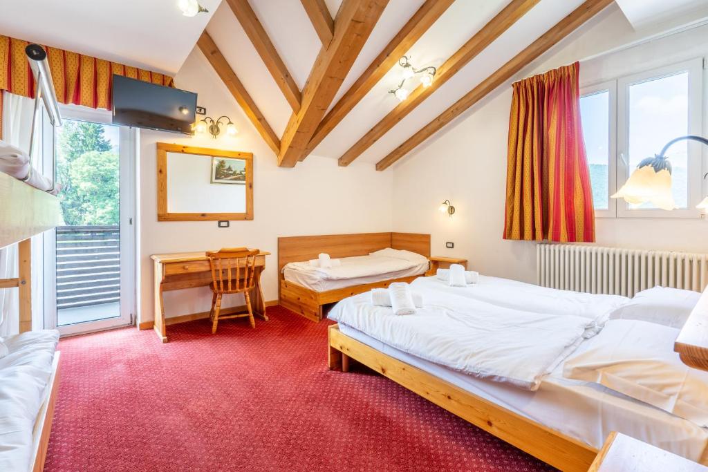 Postel nebo postele na pokoji v ubytování Hotel Polsa