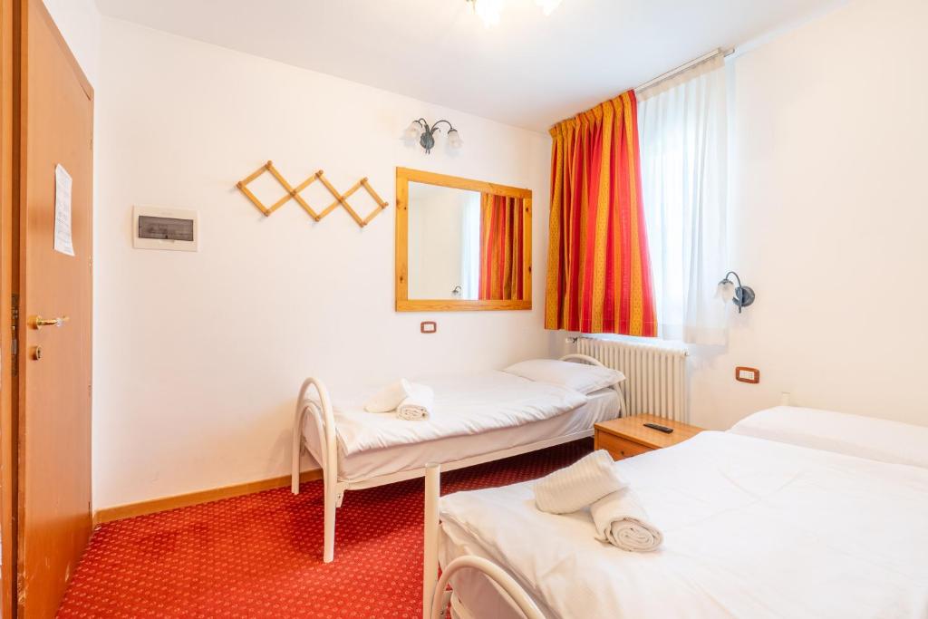 Postel nebo postele na pokoji v ubytování Hotel Polsa