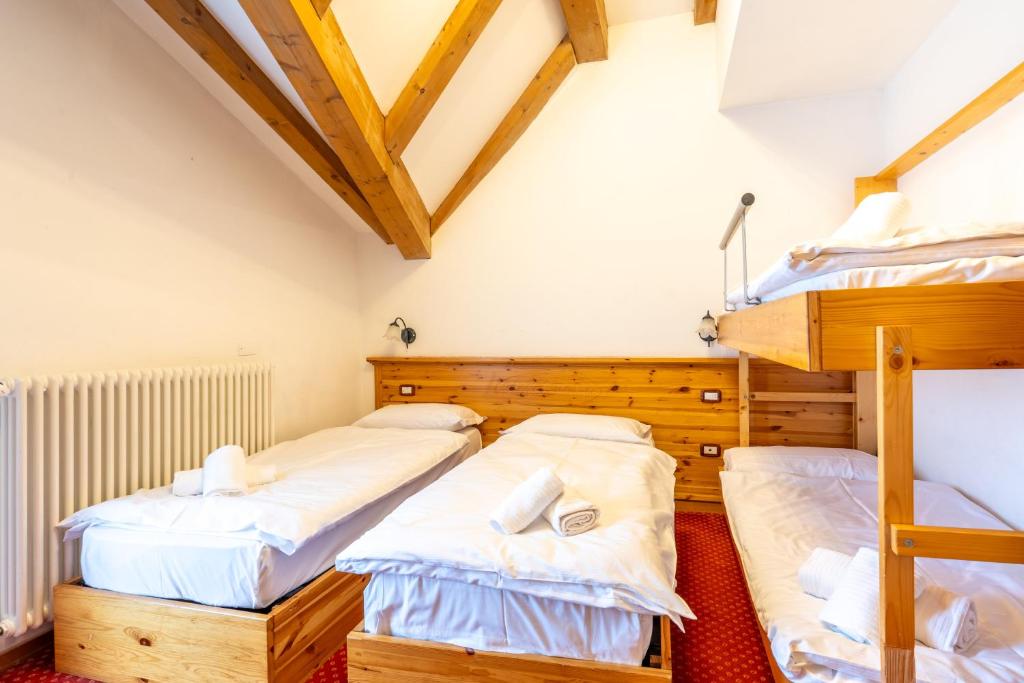 Postel nebo postele na pokoji v ubytování Hotel Polsa