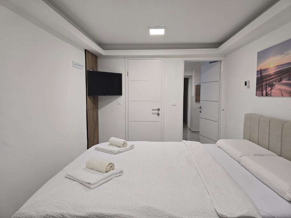 Ένα ή περισσότερα κρεβάτια σε δωμάτιο στο Edy